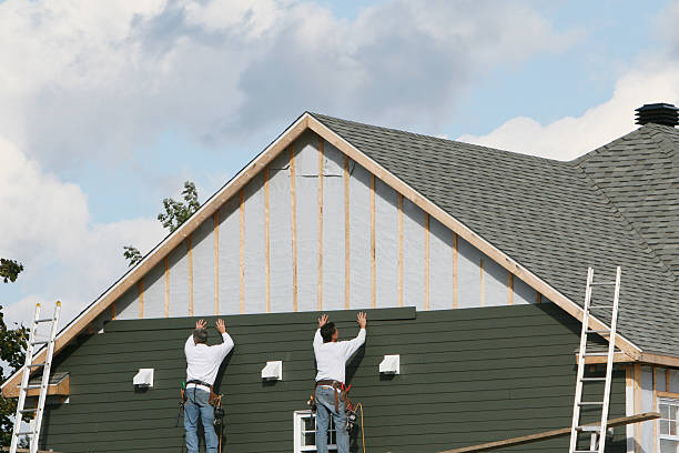 Professional Storm Damage Siding Repair technician working in DuPont, WA